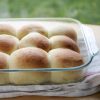 potato rolls in glass baking pan