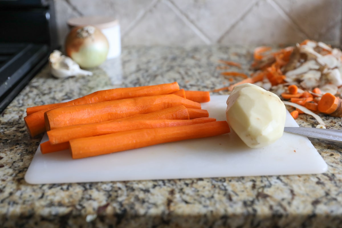 carrots and potato on cutting board