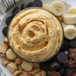 pumpkin dip with cookies and bananas around it