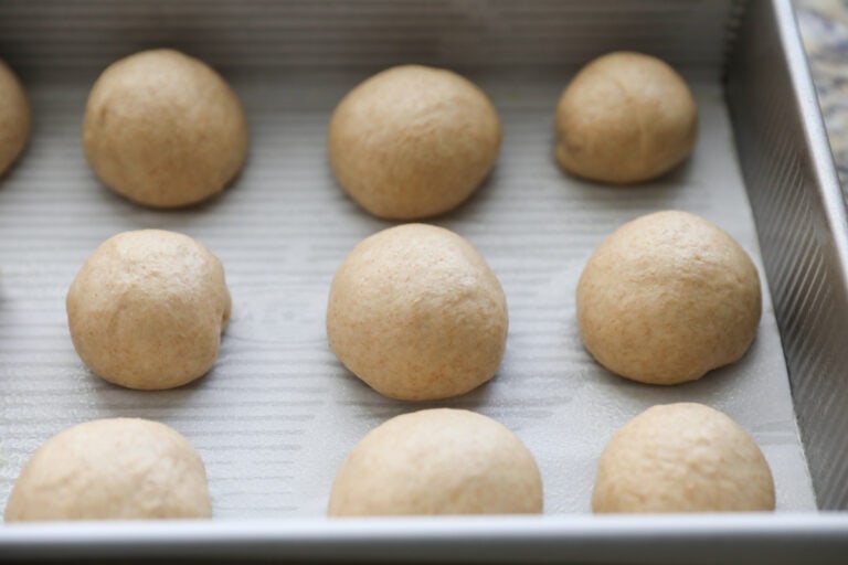raw rolls in baking pan
