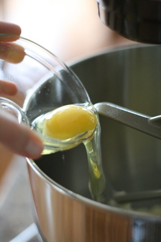 pouring egg into bowl