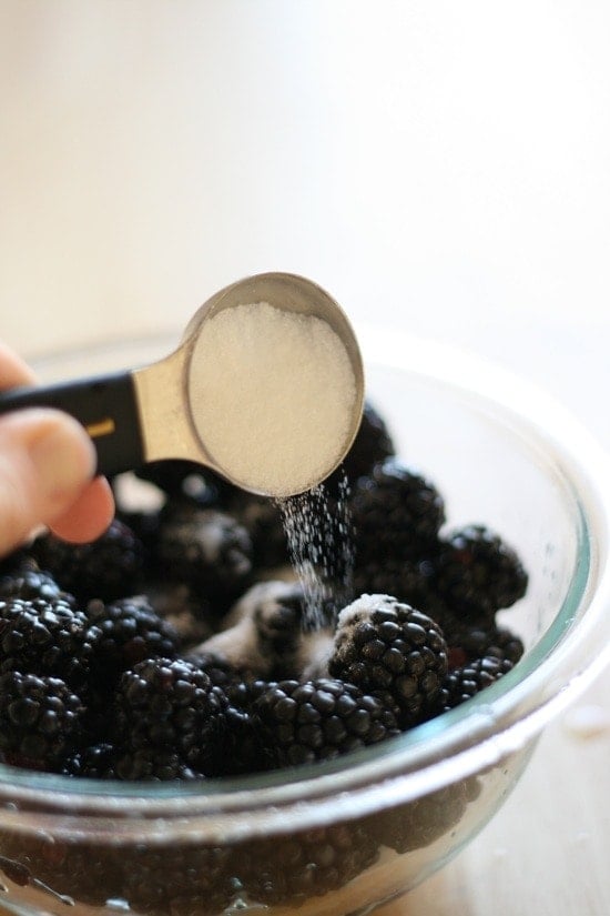 Adding sugar to berries