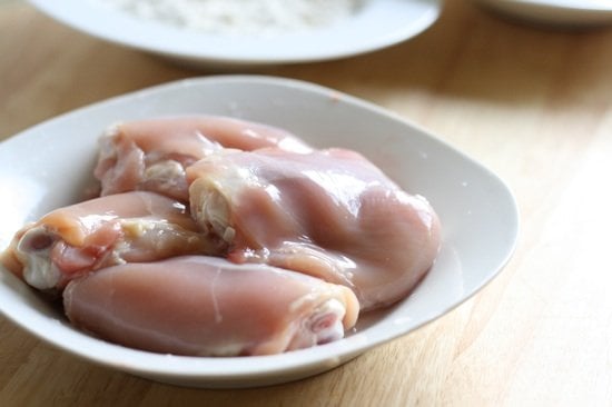 Raw chicken on a plate