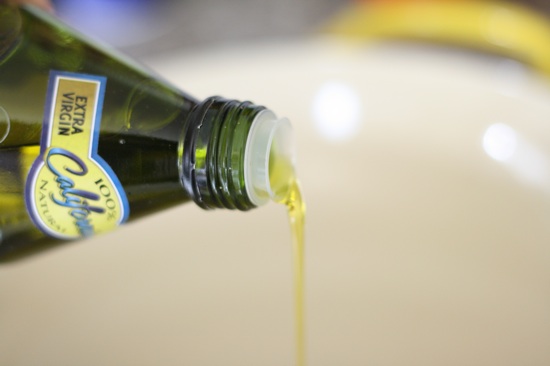 Pouring olive oil
