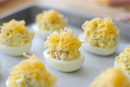 Deviled Eggs Topped with Cheese