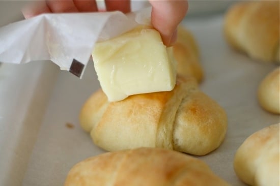 buttering baked crescent rolls