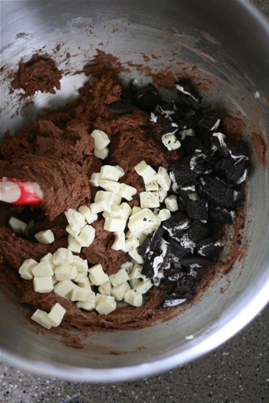 mixing in oreos and white chocolate