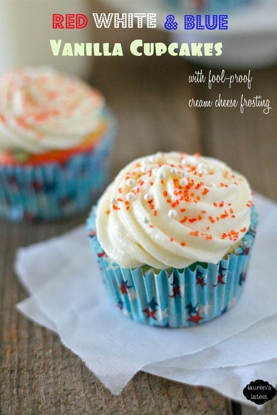 Layered Red, White and Blue Cupcakes with Cream Cheese Frosting and sprinkles