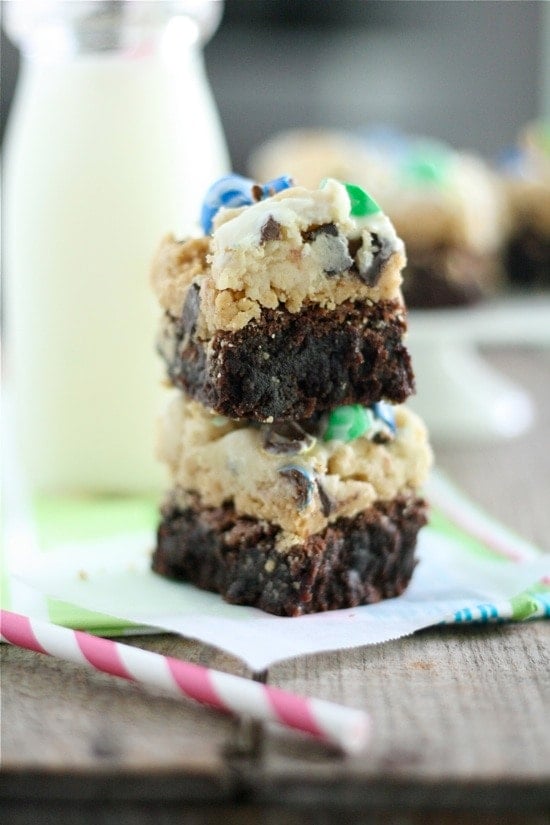 two cookie dough brownies stacked on top of each other.