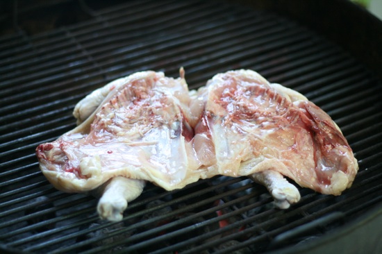 Raw chicken on a grill