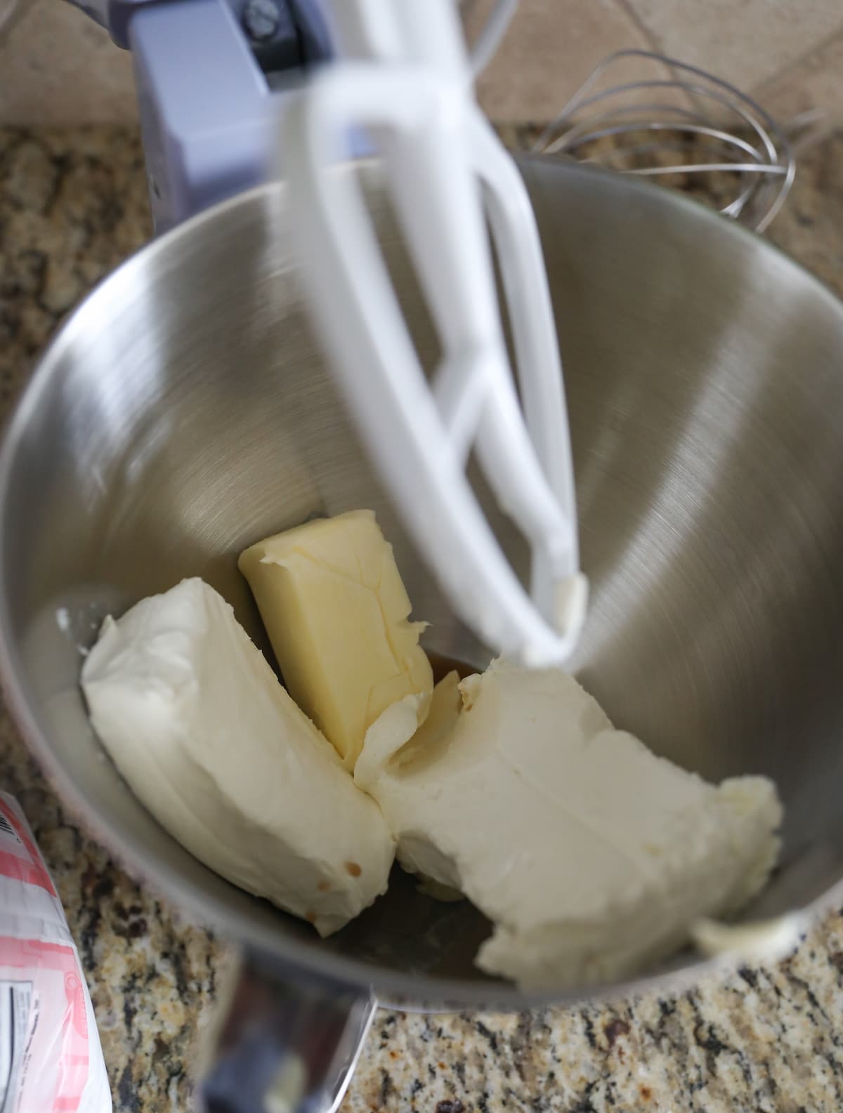 butter and cream cheese in stand mixer