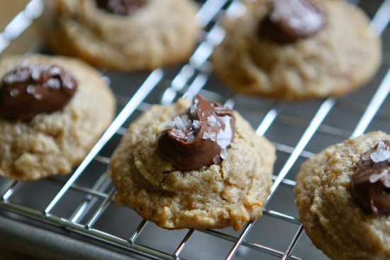 Peanut Butter Thumbprint Cookies filled with Nutella and topped with sea salt