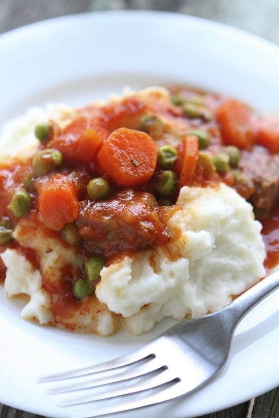 mashed potatoes with meat and veggie sauce