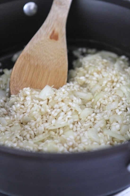 rice and onion in pan