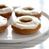 carrot cake doughnuts with cream cheese frosting