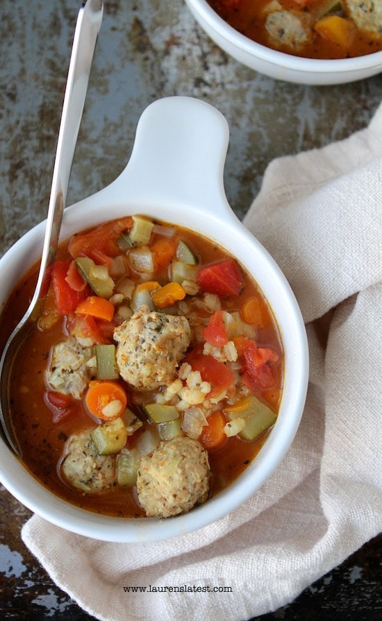 Chicken Meatball Soup in a bowl with a spoon