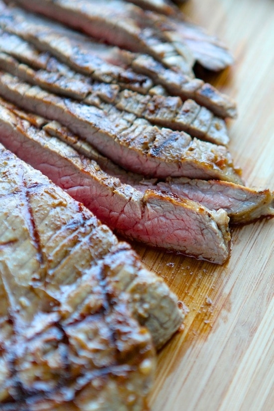 sliced Grilled Flank Steak on cutting board