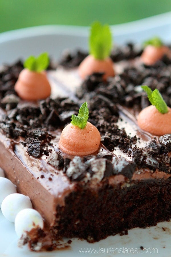 easter dirt cake with slices taken out of it