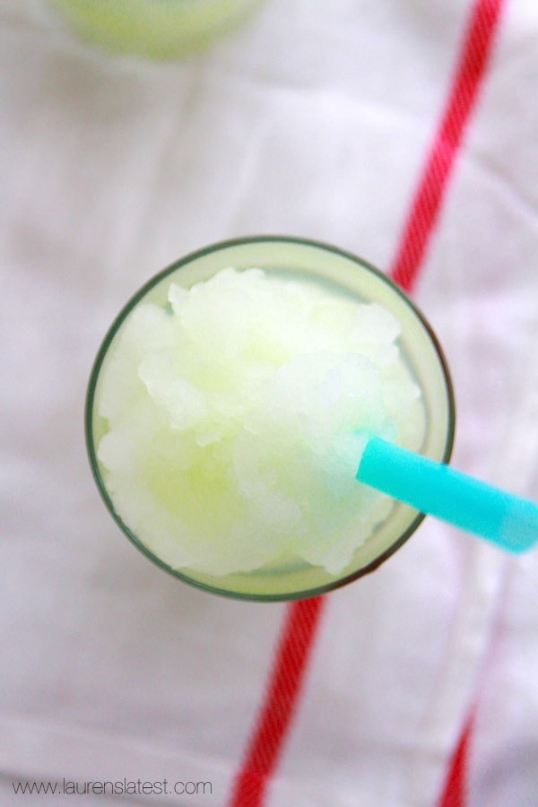 frozen lemonade in a glass with straw