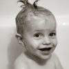little boy with soapy wet hair