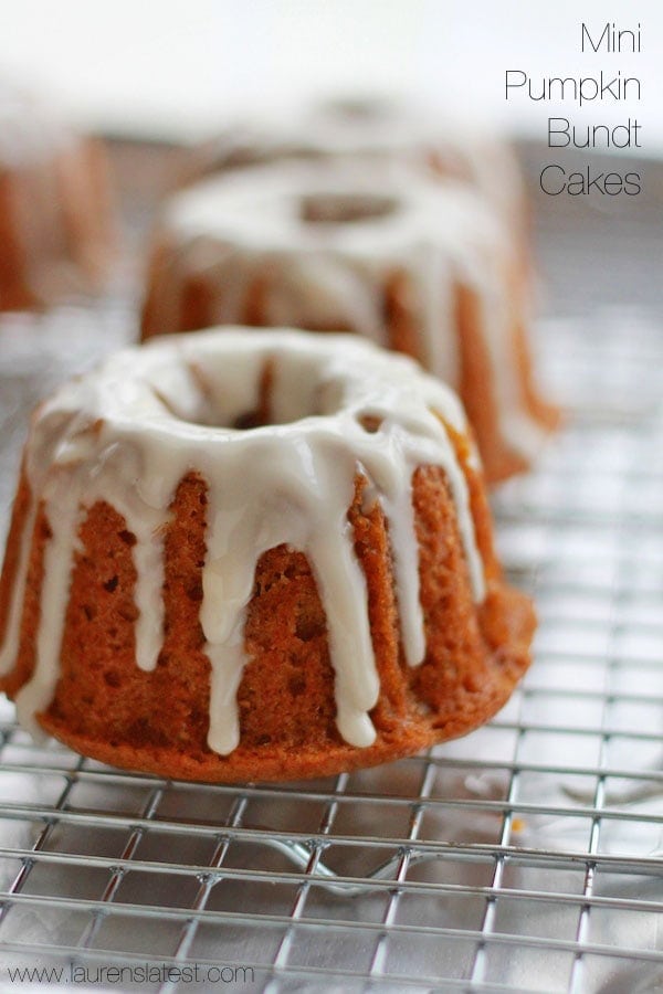 pumpkin bundt cake with icing on a cooling rack