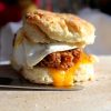 biscuit egg, cheese and fried chicken sandwich