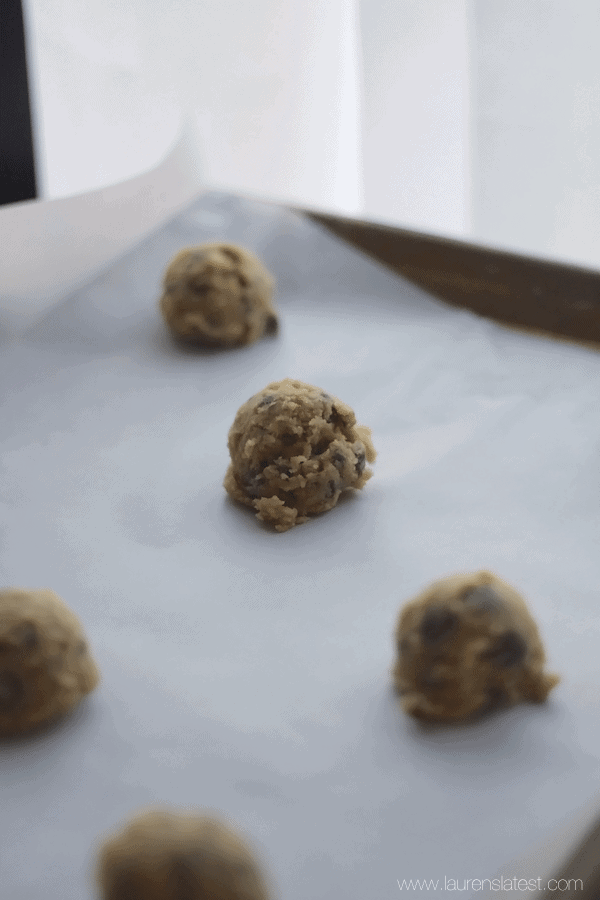 Chocolate Chip Pecan Cookie Dough Balls on a baking sheet