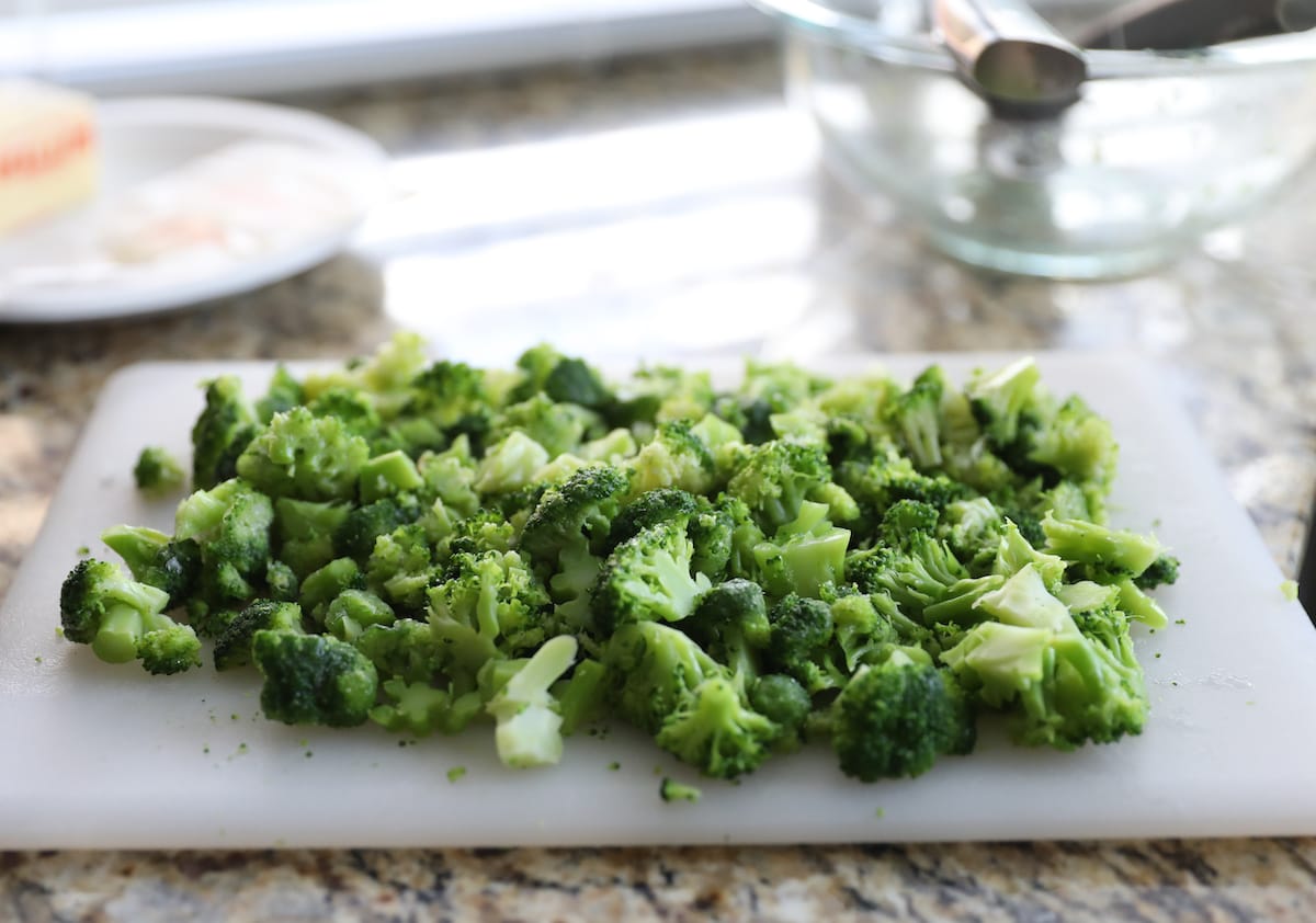 chopped broccoli on cutting board
