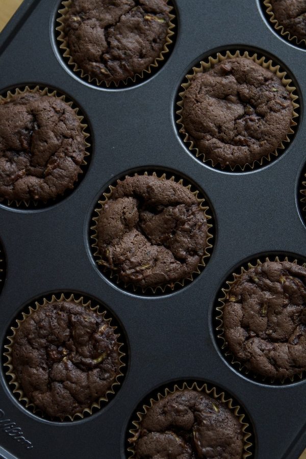 baked chocolate cupcakes in muffin tin pan
