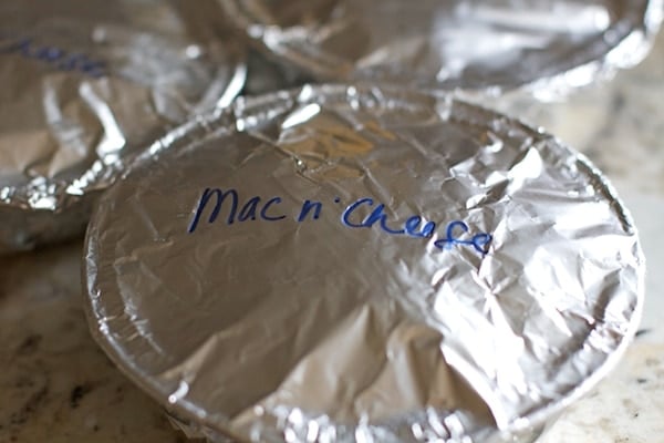 tin foil covering tins of mac and cheese