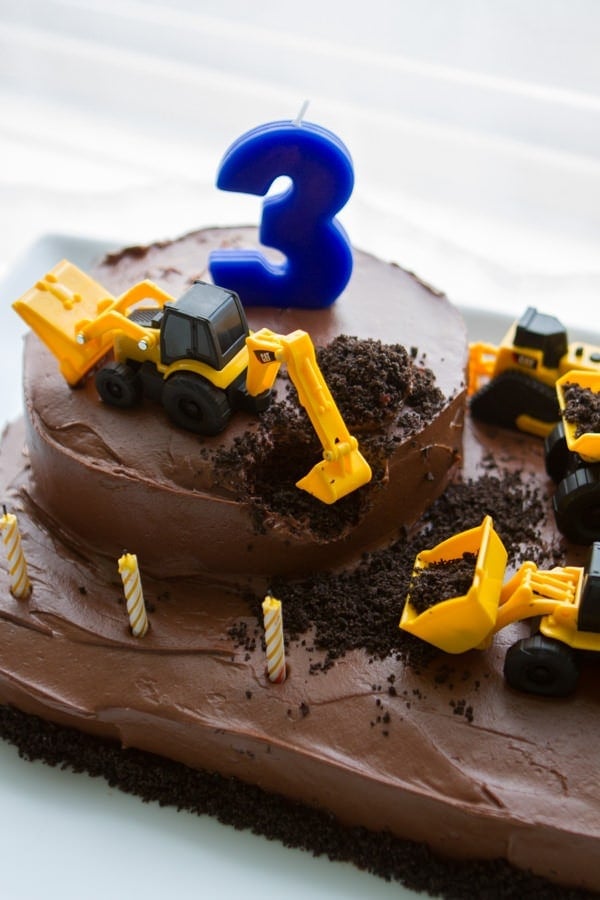 Chocolate cake with dump truck toys