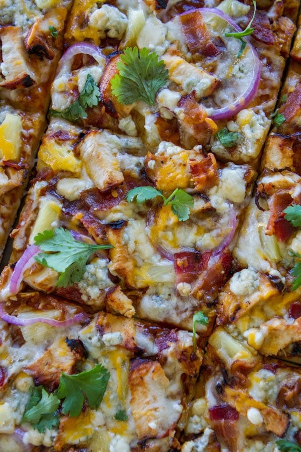 close up of sliced bbq chicken pizza