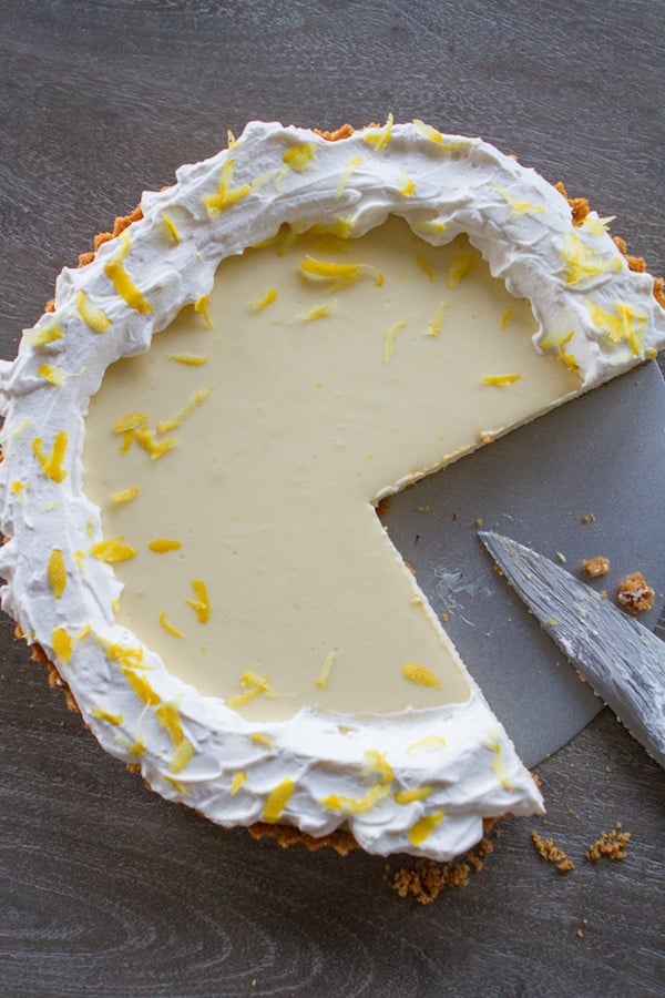 Lemon Cheesecake Tart with a couple of slices cut out