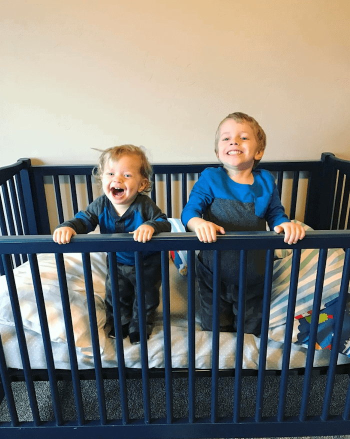 Eddie and Blake in a crib