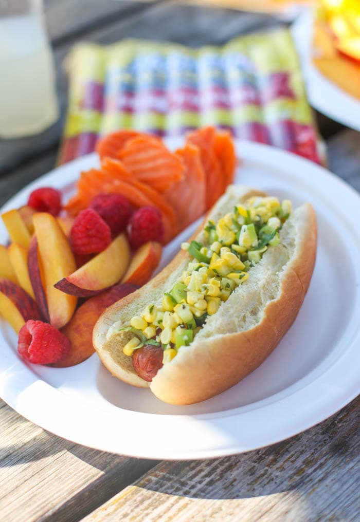 A super-fresh Mexican Corn Salad up on top of a grilled hot dog is the most glorious summer dinner ever. EVER!