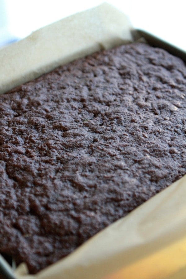 uncaut zucchini brownies in a sheet pan