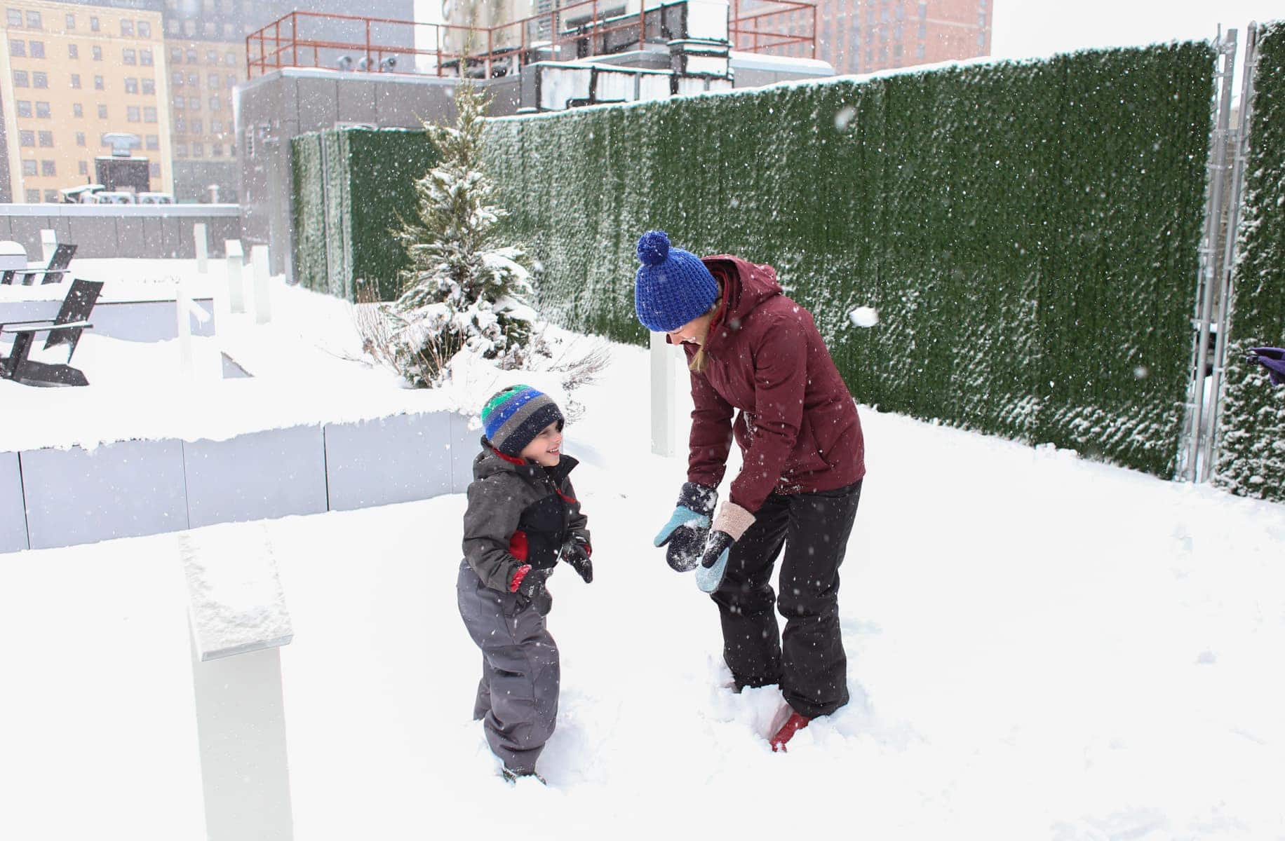 Lauren and Blake building a snowman