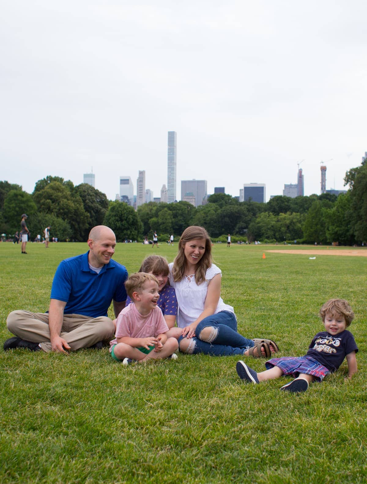 Brennan family sitting in the grass
