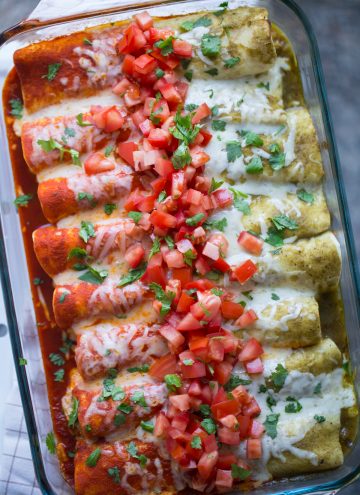 enchiladas with half red and half green sauce on them