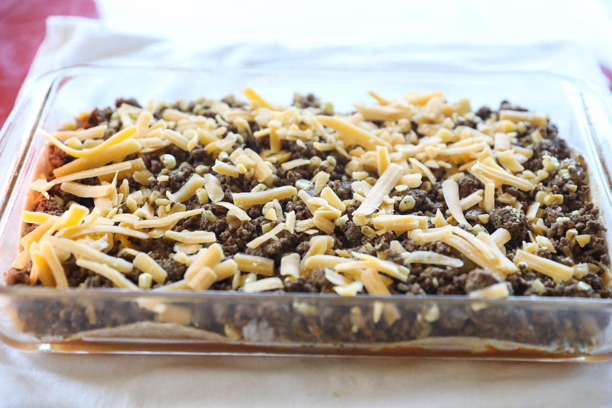 ground beef and cheese layered in baking pan