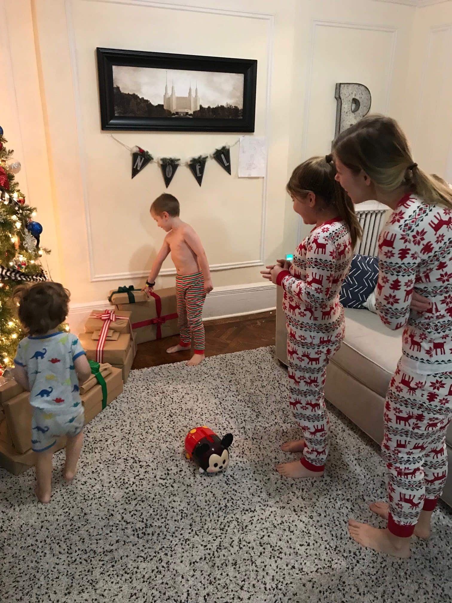 Lauren and kids looking at Christmas tree
