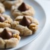 Peanut Butter Blossoms on a white plate