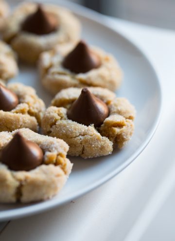 Peanut Butter Blossoms on a white plate