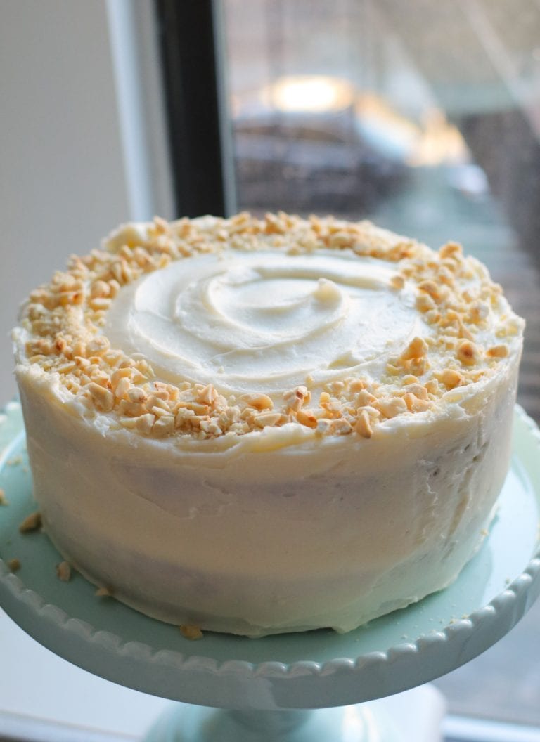 carrot cake on a blue cake stand