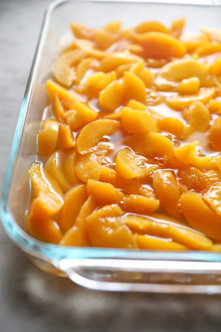 canned peaches in baking dish