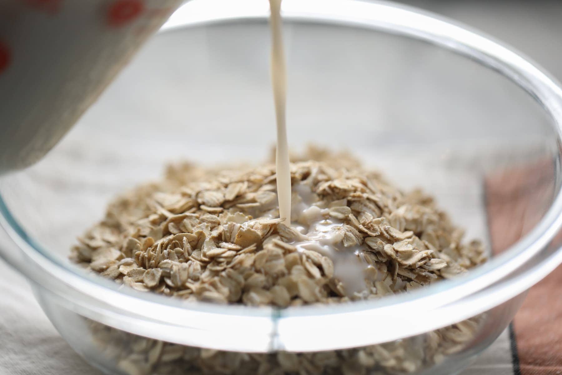 milk being poured over oats