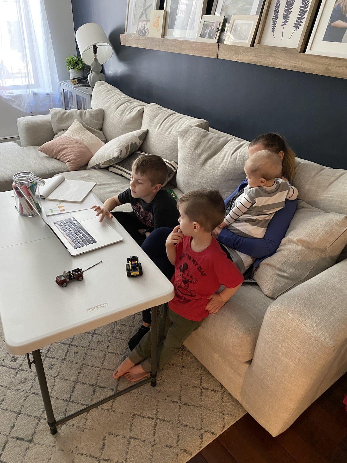 Kids remote learning on the couch