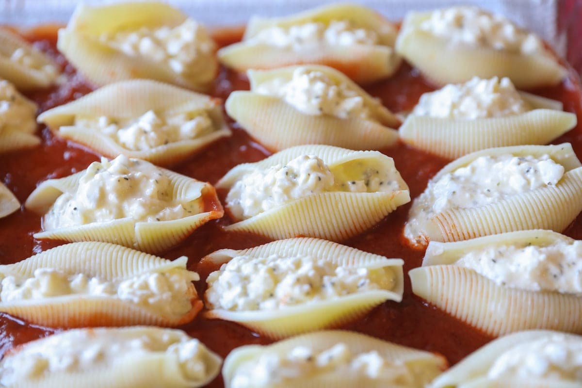 filled shells in pan