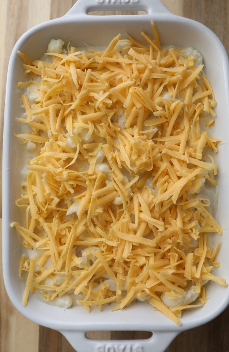 grated cheddar cheese on cauliflower au gratin