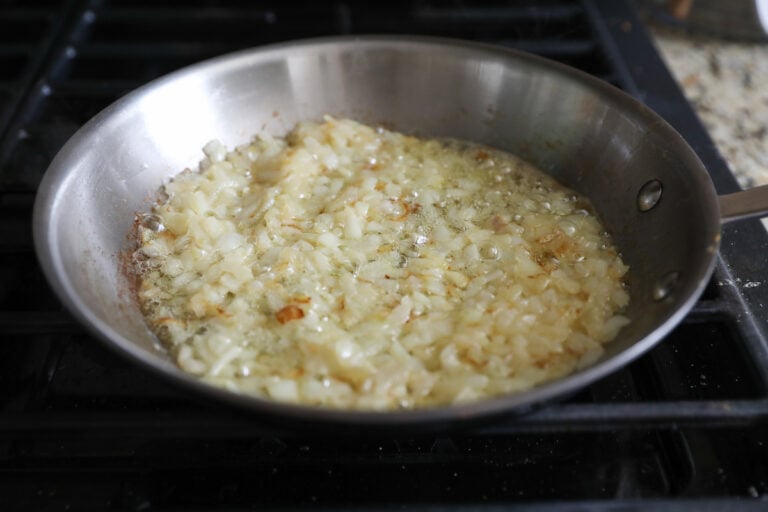 onions cooking in butter in skillet